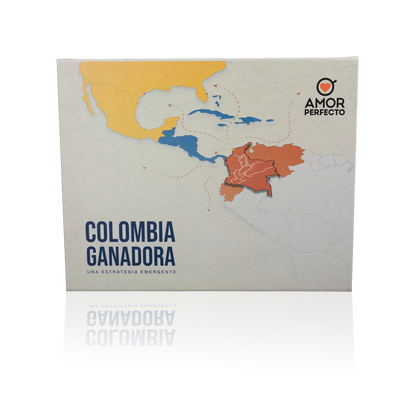 Caja de colección "Colombia Ganadora" de Amor Perfecto. El kit premium incluye el libro sobre la estrategia del café colombiano y una bolsa de café de especialidad en grano, todo presentado en un empaque de regalo exclusivo.